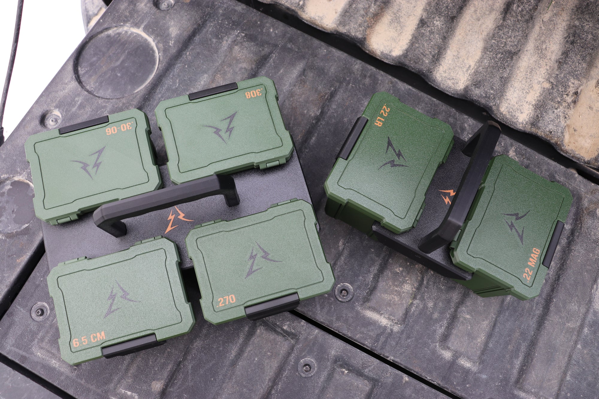 East Ridge Ammo boxes on a tailgate inside the 2 and 4 box carriers