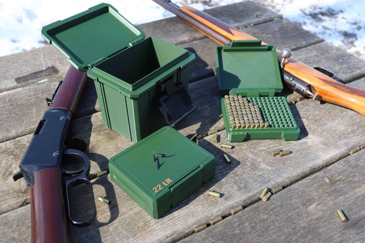 East Ridge 22 LR ammo cases on a shooting bench
